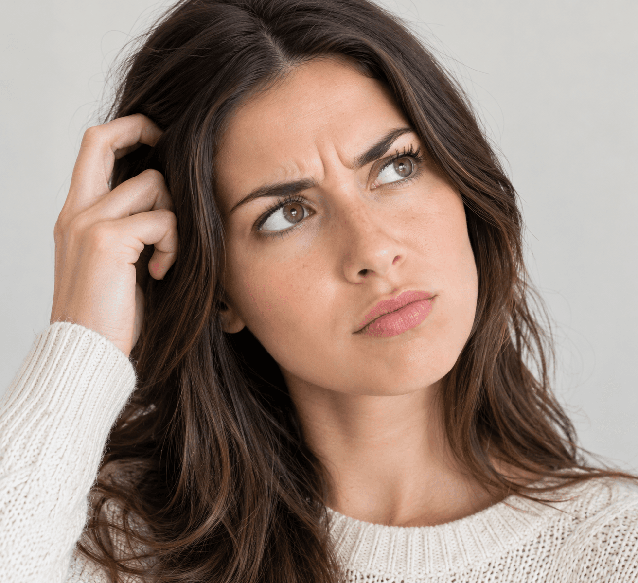 A woman looking puzzled