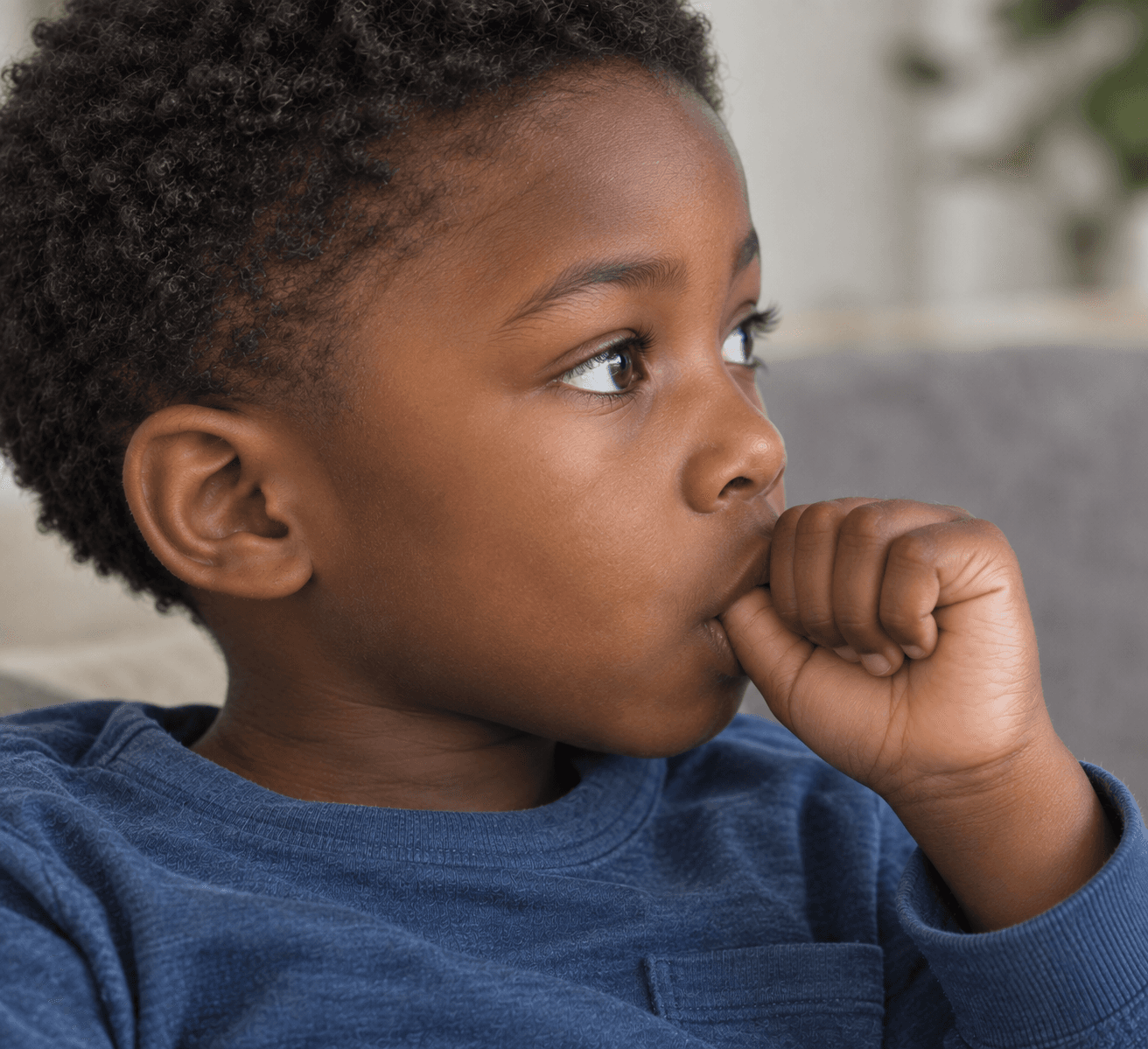 A child sucking his thumb
